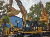 2025 Caterpillar 329D crawler excavator, front three-quarter view