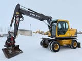 2004 Volvo EW140B wheel excavator, side view