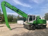 2012 Sennebogen 825 material handler side view