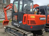 2022 Doosan DH60-7 mini excavator, rear three-quarter view