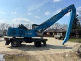 2011 Fuchs MHL340 wheel excavator, side view