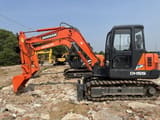 Doosan DH55 crawler excavator, side view