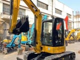 2022 Caterpillar 303.5 C CR mini excavator, front three-quarter view
