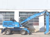 Manutentionnaire Fuchs MHL320D de 2011, vue latérale