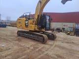 2018 Caterpillar 323FL crawler excavator, side profile view