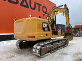 2018 Caterpillar 323 crawler excavator, rear three-quarter view