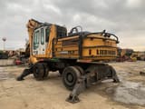 2012 Liebherr A924C Litronic material handler, rear three-quarter view