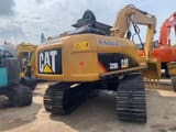 2010 Caterpillar 320D rupsgraafmachine achteraanzicht