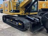 2024 Caterpillar 307E2 excavator, rear three-quarter view