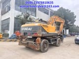 2022 Hyundai R210W-9 wheel excavator rear three-quarter view