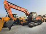 2024 Doosan DX225LCA crawler excavator, side view