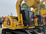 2024 Komatsu PC70-8 mini excavator, rear three-quarter view