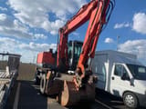 2001 O&K MH 5.5 wheel excavator, front three-quarter view