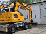 2017 Liebherr A914 COMPACT wheel excavator rear three-quarter view