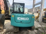 Kobelco SK60 mini excavator, rear view