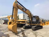 2022 Caterpillar 323D2L crawler excavator, front three-quarter view