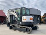 2012 Bobcat E60 mini excavator, rear three-quarter view