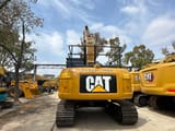 2024 Caterpillar 323D2L crawler excavator, rear view