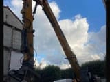 2014 JCB JS360 demolition excavator, side view with high-reach boom