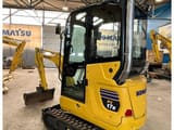 2023 Komatsu PC 17 R-5 mini excavator, rear three-quarter view