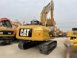 Koparka gąsienicowa 2010 Caterpillar 320D, widok z tyłu pod kątem