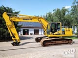 2012 Komatsu PC240LC-10 crawler excavator, side profile view