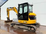 2018 JCB 48Z-1 mini excavator, three-quarter view