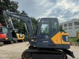 2023 Volvo EC55D mini excavator, side profile view