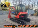 2024 Kubota U48-4 mini excavator, front three-quarter view