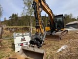 2022 Caterpillar 313 Next Gen excavator with tiltrotator, front view