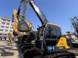 2023 Volvo EC140 crawler excavator, side view