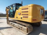 2020 Caterpillar 323 crawler excavator, rear three-quarter view