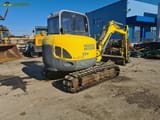 2009 Wacker Neuson 6003 mini excavator, rear three-quarter view