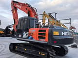 2023 Hitachi Zaxis 210LC crawler excavator, rear three-quarter view