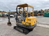 2000 Volvo EB12 mini excavator, rear three-quarter view
