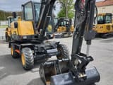 2021 Volvo EW60E wheel excavator, front three-quarter view