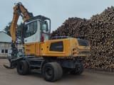 2015 Liebherr LH35 M material handler, rear three-quarter view