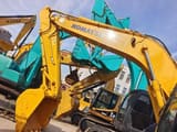 Komatsu PC200-7 crawler excavator boom and bucket view
