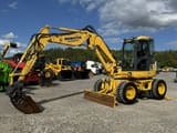 2009 Komatsu PW98MR-8 wheel excavator side view