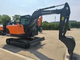 2026 Doosan DX60D mini excavator, side profile view