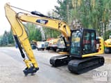 2015 Caterpillar 312E crawler excavator, side view