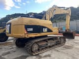 Escavatore cingolato Caterpillar 320D del 2012, vista posteriore tre quarti
