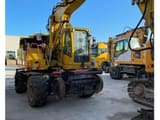 2015 Atlas 1404 M Z wheel excavator, front three-quarter view