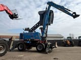 2019 Fuchs MHL 310 wheel excavator side view