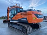 2021 Doosan DX225LC crawler excavator, rear three-quarter view