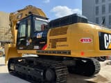 2019 Caterpillar 330DL crawler excavator, rear three-quarter view