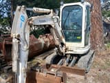 2012 Kubota U25-3EU mini excavator, front three-quarter view