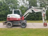 2013 Takeuchi TB295W wheel excavator side view