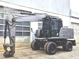 2020 Caterpillar M320F wheel excavator, side profile view