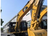 2023 Caterpillar 330D2L crawler excavator, front three-quarter view